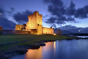 Images Dated 7th November 2013: Ross Castle lit up at twilight, Killarney National Park, County Kerry, Republic of Ireland
