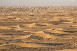 Sand dunes below the northern slopes of Djebel Ouarkziz, Sahara desert, Southern Morocco Sand dunes below the northern slopes of Djebel Ouarkziz, Sahara desert, Southern Morocco