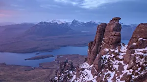 Sandstone pinnacles and view of lochs below, Stac Pollaidh Inverpolly, Highlands of Scotland Sandstone pinnacles and view of lochs below, Stac Pollaidh Inverpolly, Highlands of Scotland