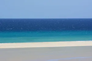Sandy beach and bright blue ocean, Fuerteventura, Canary Islands. April 2013 Sandy beach and bright blue ocean, Fuerteventura, Canary Islands. April 2013