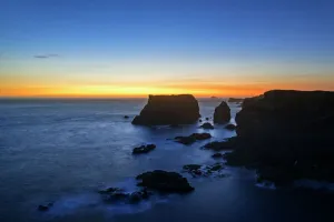 Sea stacks and cliffs at sunset at Eshaness / Esha Ness, peninsula in Northmavine Sea stacks and cliffs at sunset at Eshaness / Esha Ness, peninsula in Northmavine