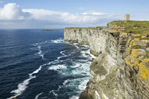 Seabird cliffs, Marwick Head RSPB and Kitchener Memorial tower, Orkney, Scotland, UK Seabird cliffs, Marwick Head RSPB and Kitchener Memorial tower, Orkney, Scotland, UK