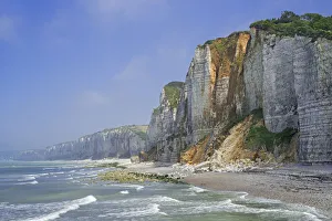 Shingle beach and chalk cliffs along the North Sea coast at Yport, Normandy, France Shingle beach and chalk cliffs along the North Sea coast at Yport, Normandy, France