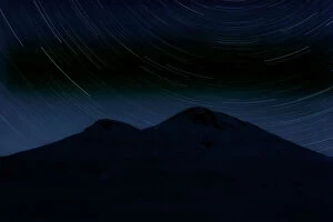 Images Dated 26th June 2008: Star trails over Mount Elbrus (5, 642m) at night, Caucasus, Russia, June 2008