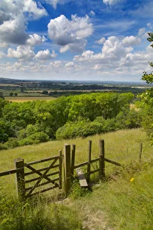 Stile and footpath, Aldbury Nowers Nature Reserve, the Chilterns, Hertfordshire, UK Stile and footpath, Aldbury Nowers Nature Reserve, the Chilterns, Hertfordshire, UK