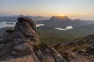 Summer sunrise looking towards Cul Mor from Stac Pollaidh, Inverpolly, Highlands, Scotland. August, 2019 Summer sunrise looking towards Cul Mor from Stac Pollaidh, Inverpolly, Highlands, Scotland. August, 2019