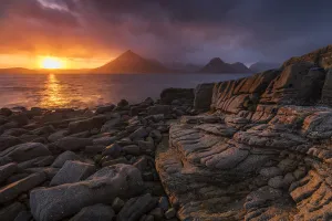 Sunset over the Cullin Mountains from Elgol shoreline, Isle of Skye, Scotland, UK, April Sunset over the Cullin Mountains from Elgol shoreline, Isle of Skye, Scotland, UK, April