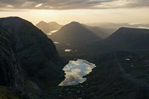 Uplands Gallery: Sunset over Loch Coire Mhic Fhearchair from Beinn Eighe with the sky reflected in the water