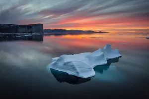 Sunset off Scott Island, with floating pieces of sea ice, Scott Inlet, Baffin Island, Canadian Arctic, August 2015 Sunset off Scott Island, with floating pieces of sea ice, Scott Inlet, Baffin Island, Canadian Arctic, August 2015