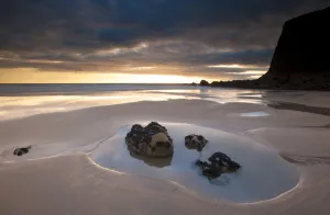 A tide pool on Duckpool beach in the evening light. North Cornwall, UK, August 2010 A tide pool on Duckpool beach in the evening light. North Cornwall, UK, August 2010