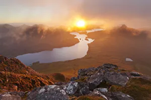 View from summit of Cul Beag overlooking Loch Lurgainn and Stac Pollaidh at sunset View from summit of Cul Beag overlooking Loch Lurgainn and Stac Pollaidh at sunset
