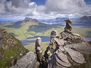 View from summit of Sgorr Tuath, sandstone pinnacles, Assynt mountains, Highland View from summit of Sgorr Tuath, sandstone pinnacles, Assynt mountains, Highland