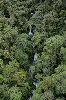 Waterfall inside a rainforest located in a transition between Choco and cloud forest Waterfall inside a rainforest located in a transition between Choco and cloud forest