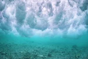 Wave breaking over the rubble zone close to the reef crest of a coral reef Wave breaking over the rubble zone close to the reef crest of a coral reef