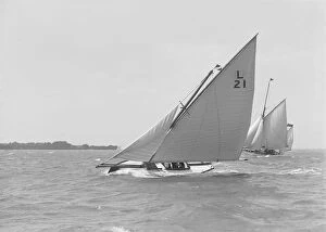 Kirk Sons Of Cowes Collection: The 6 Metre Cheetal (L21) sailing upwind, 1911. Creator: Kirk & Sons of Cowes