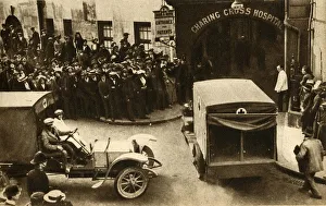 Prints of An ambulance driving into Charing Cross Hospital with casualties from the bloody battle at Mons, London, 1914, (1933) Ambulance Prints: Ambulance at Charing Cross Hospital, London 1914 Print