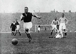 Arsenal footballer Alex James passes three Manchester City players, c1929-c1937. Artist: Graphic Photo Union Arsenal footballer Alex James passes three Manchester City players, c1929-c1937. Artist: Graphic Photo Union