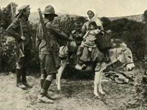 Australian soldier giving water to a Turkish family, First World War, 1915-1916, (c1920) Australian soldier giving water to a Turkish family, First World War, 1915-1916, (c1920)