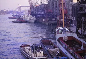 Barges in the Pool of London. River Thames and Tower Bridge, London, 1962. Artist: CM Dixon Barges in the Pool of London. River Thames and Tower Bridge, London, 1962. Artist: CM Dixon