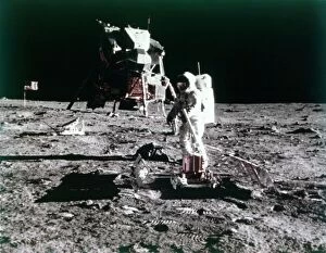 Buzz Aldrin sets up the seismic experiment, Apollo II mission, July 1969. Creator: Neil Armstrong