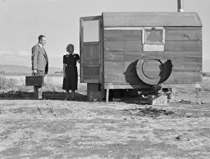 The camp nurse introduces doctor to mother of sick baby, Merrill, Klamath County, Oregon, 1939. Creator: Dorothea Lange The camp nurse introduces doctor to mother of sick baby, Merrill, Klamath County, Oregon, 1939. Creator: Dorothea Lange