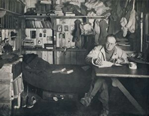 Captain Scott Writing His Diary in the Hut at Cape Evans, c1911, (1914). Creator: Herbert Ponting
