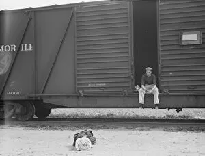 Bindle Stiff Gallery: Car on siding across tracks from pea packing plant, Calipatria, Imperial Valley, 1939