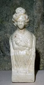 Ceramic figurine of a Mother Goddess, sitting in a chair and nursing a baby, 2nd century