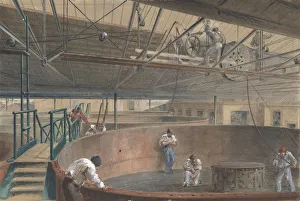 Coiling the Cable in the Large Tanks at the Works of the Telegraph Construction Coiling the Cable in the Large Tanks at the Works of the Telegraph Construction