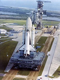 Crawler moving Space Shuttle to launch complex 39, Kennedy Space Center, USA, 1980s Crawler moving Space Shuttle to launch complex 39, Kennedy Space Center, USA, 1980s