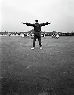 Games master taking a gym class, Airedale school, Castleford, West Yorkshire, 1962 Games master taking a gym class, Airedale school, Castleford, West Yorkshire, 1962