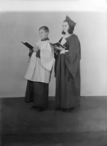 Girl and boy chorister, (Isle of Wight?), c1935. Creator: Kirk & Sons of Cowes Girl and boy chorister, (Isle of Wight?), c1935. Creator: Kirk & Sons of Cowes