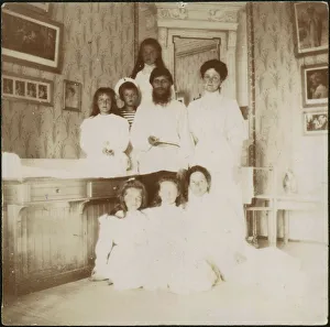 Grigory Rasputin with Empress Alexandra Fyodorovna, her five children Grigory Rasputin with Empress Alexandra Fyodorovna, her five children