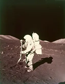 Apollo 17 Gallery: Harrison Schmitt collects lunar rake samples, Apollo 17 mission, December 1972. Creator: NASA