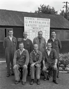 ICI powder works team in front of the Safety League board, Denaby Main, South Yorkshire, 1962 ICI powder works team in front of the Safety League board, Denaby Main, South Yorkshire, 1962