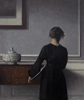 Related Images Gallery: Interior with Young Woman from Behind. Artist: Hammershoi, Vilhelm (1864-1916)
