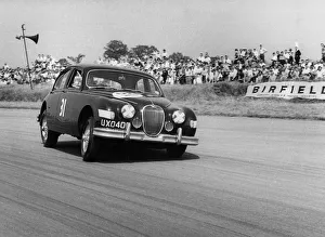 Jaguar Mk1 racing at Silverstone. Creator: Unknown Jaguar Mk1 racing at Silverstone. Creator: Unknown