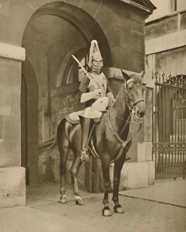 A Living Statue in Whitehall: The Lifeguards Sentry, c1935. Creator: Unknown