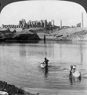 Looking across the Sacred Lake to the great temple at Karnak, Thebes, Egypt, 1905.Artist: Underwood & Underwood