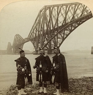Forth Bridge Gallery: Men in Highland dress in front of the Forth Bridge, Scotland.Artist: Underwood & Underwood