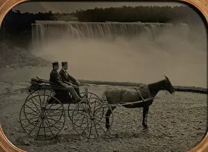 Gold Colour Gallery: Two Men Seated in a Horse-Drawn Carriage in Front of Niagara Falls, 1860s