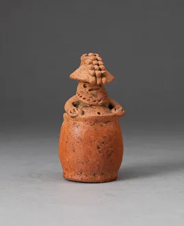 Miniature Rattle in the Form of a Figure Wearing Headdress and Mask, c. A.D. 200 Miniature Rattle in the Form of a Figure Wearing Headdress and Mask, c. A.D. 200