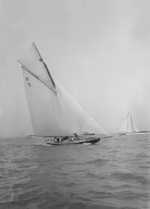Mrs GA Shenley at the helm of the 8 Metre class Spero (H8). Creator: Kirk & Sons of Cowes Mrs GA Shenley at the helm of the 8 Metre class Spero (H8). Creator: Kirk & Sons of Cowes