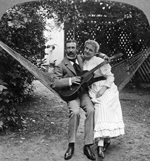 Images Dated 22nd April 2009: The Musical Pair in the Hammock.Artist: American Stereoscopic Company