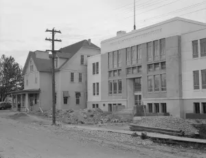 The new WPA courthouse alongside the old county courthouse, Bonners Ferry, Idaho, 1939. Creator: Dorothea Lange The new WPA courthouse alongside the old county courthouse, Bonners Ferry, Idaho, 1939. Creator: Dorothea Lange