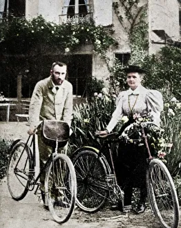 Pierre and Marie Curie, French physicists, preparing to go cycling Pierre and Marie Curie, French physicists, preparing to go cycling