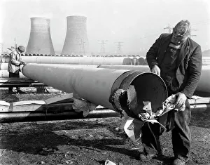 Pipe wrapping to prevent corrosion on steel pipes, Old Denaby, South Yorkshire, 1961 Pipe wrapping to prevent corrosion on steel pipes, Old Denaby, South Yorkshire, 1961