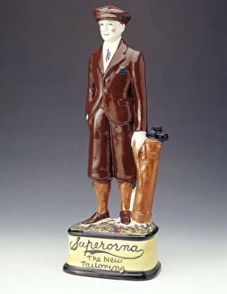 Pottery figure of a golfer advertising Superorna tailoring, 1920s