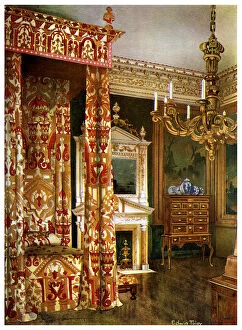 Images Dated 27th February 2009: Queen Annes bed, chest of drawers upon a stand and a wooden candelabra, 1910.Artist: Edwin Foley