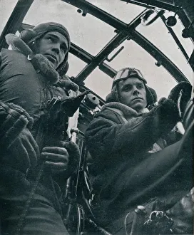 RAF bomber pilot and second pilot, 1941. Artist: Unknown RAF bomber pilot and second pilot, 1941. Artist: Unknown